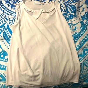 Sleeveless white blouse
